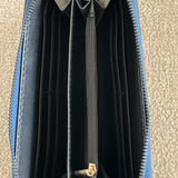 Inside of leather wallet in navy blue