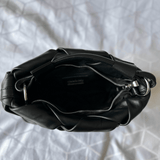 Inside of woven leather bag