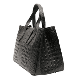 Black leather tote bag side view