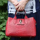 Burgundy leather tote bag on model