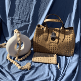 Taupe leather tote bag styled