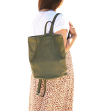 Olive Green Leather Backpack open on model