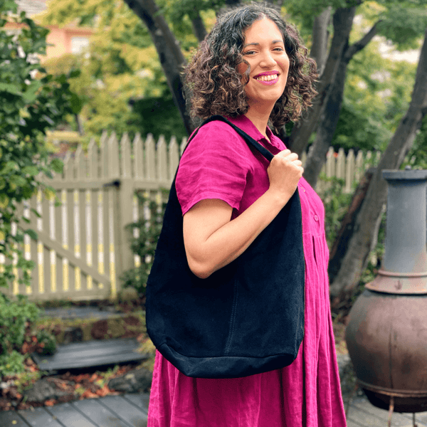 Black suede hobo bag in Australia