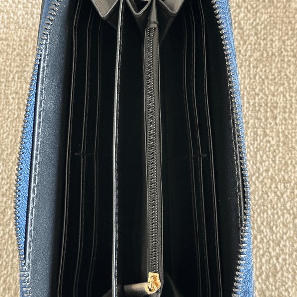 Inside of leather wallet in navy blue