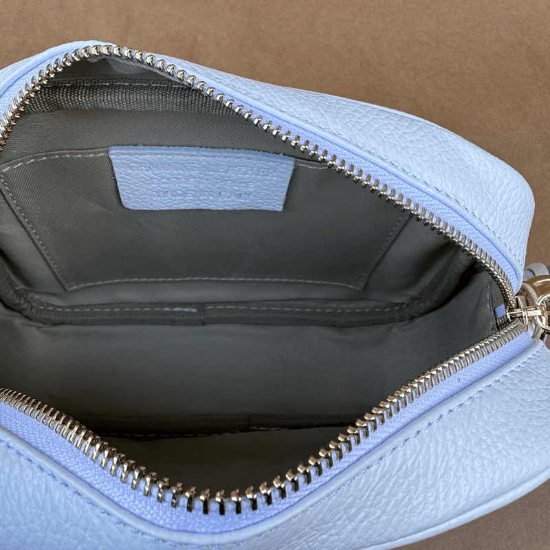 Sidekick leather crossbody bag with beige lining inside