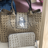 Taupe leather tote bag with wallet close up 